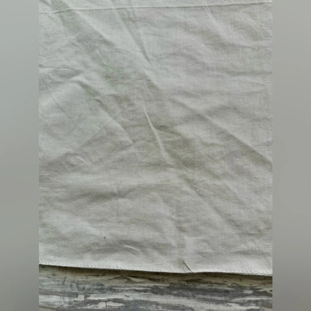 Pier 1 Imports taupe table runner with embroidered hexagon pattern